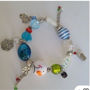 Festive Beaded Bracelet with Snowman Charm